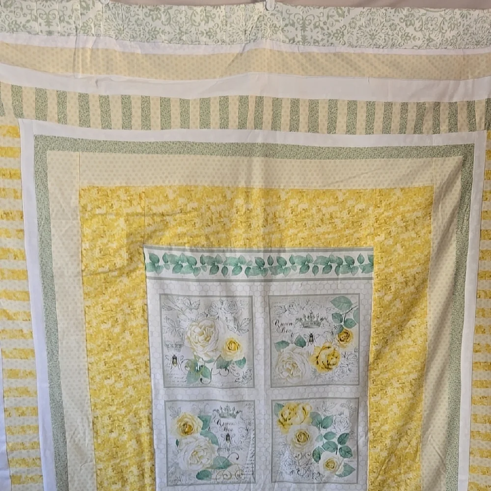 Cheerful Yellow and White Quilt with Decorative Patterns